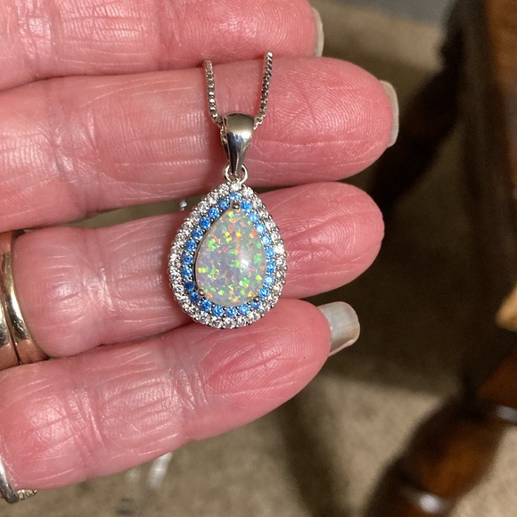 Beautiful fire Opal with light blue and clear stones stamped 925 - Picture 6 of 9